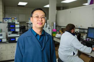 Photo of Jian Shi, assistant professor in the UK Department of Biosystems and Agricultural Engineering, in his lab.