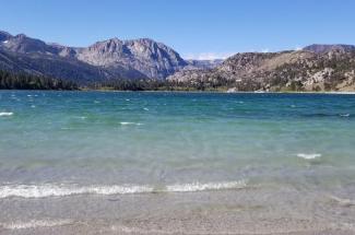 June Lake beach in the Sierra Nevada of California. Climate change is disrupting the water cycle in the Sierra Nevada in ways that are challenging to predict, which lowers society's resilience by limiting water resources. Photo by Mike McGlue.